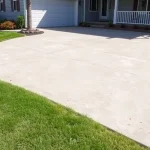 should i repair or replace sunken concrete driveway